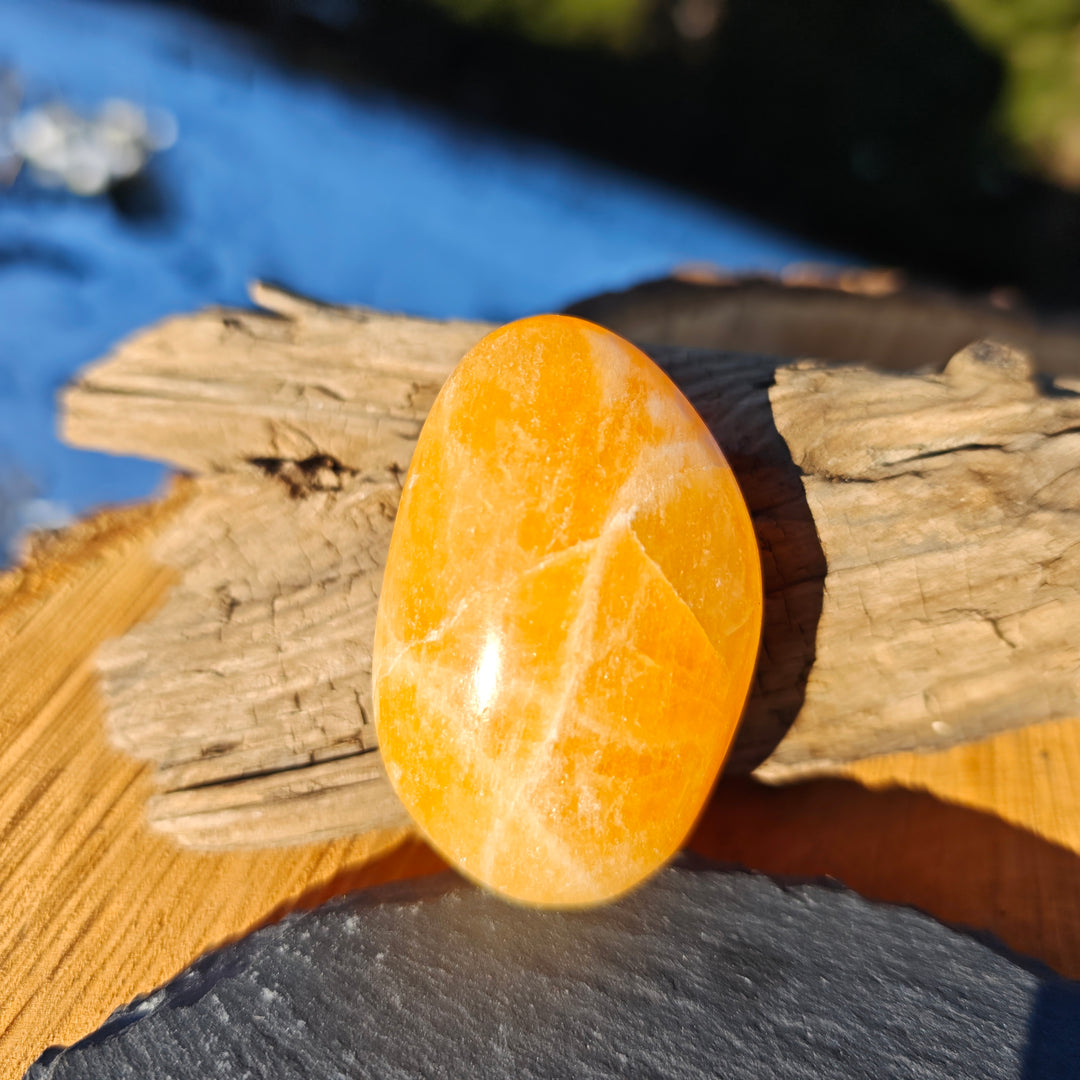 Calcit orange (Entwicklung-Optimismus) Handschmeichler 6 zur Auswahl