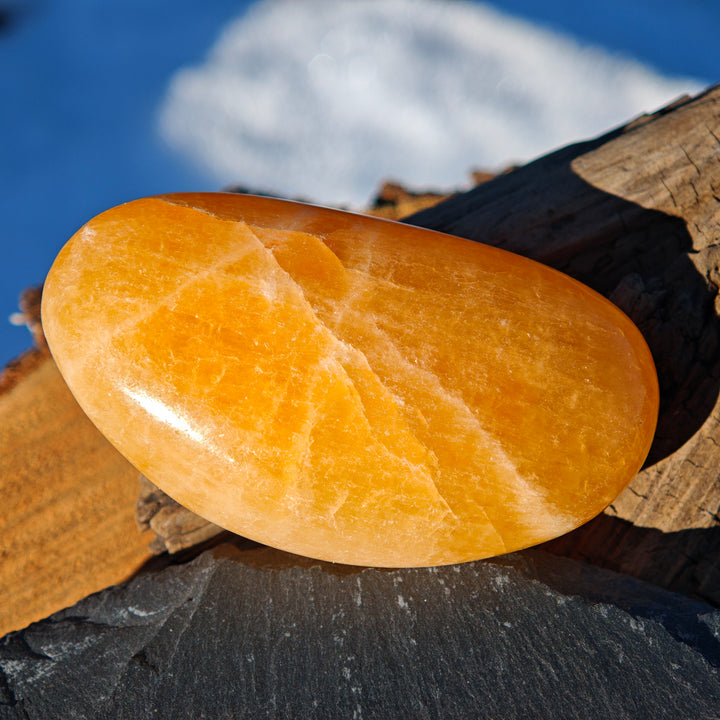 Calcit orange (Entwicklung-Optimismus) Handschmeichler 6 zur Auswahl